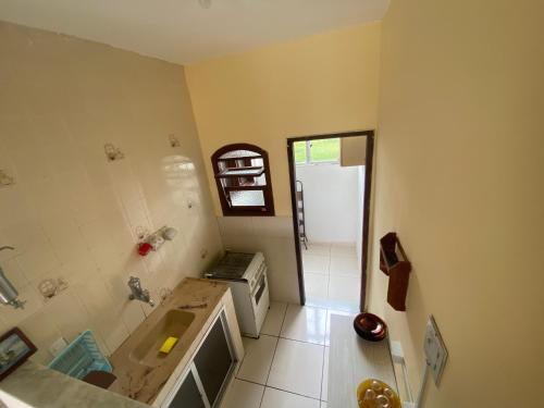 Cuina o zona de cuina de APARTAMENTO - CASA EM CABO FRIO (BRAGA)