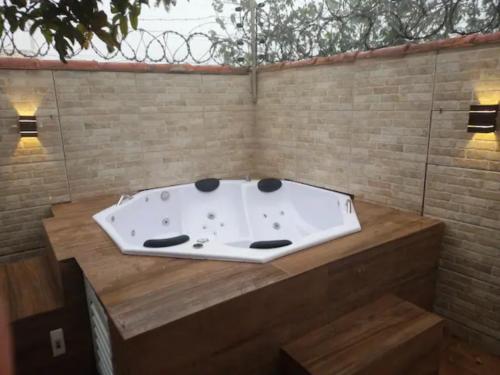 Ảnh trong thư viện ảnh của CASA COM SPA DE HIDRO, AQUECEDOR E CROMOTERAPIA A 1,0 kM DO CENTRO ở Chapada dos Guimarães