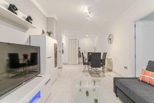A television and/or entertainment centre at Apartamento Bazán Granada