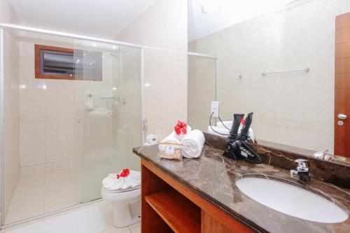 Bilik mandi di Sun Bay Pipa Hotéis