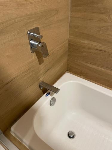 a sink in a bathroom with a faucet at Camino al mar "Departamento en playa" in Mazatlán