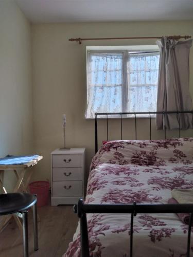 מיטה או מיטות בחדר ב-1 Double room with shared bathroom