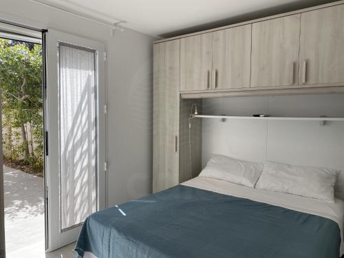Postel nebo postele na pokoji v ubytování Villa Grace By Cala Salento
