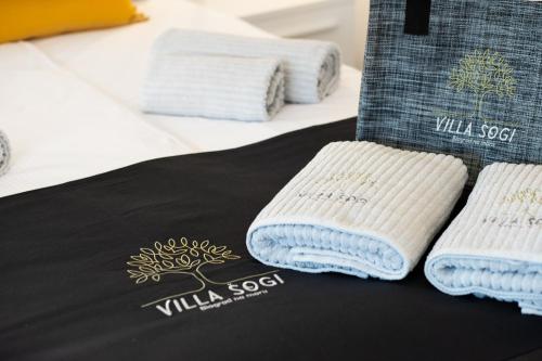 Posteľ alebo postele v izbe v ubytovaní VILLA SOGI