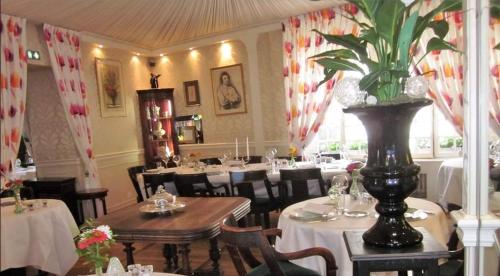 Restoranas ar kita vieta pavalgyti apgyvendinimo įstaigoje HOTEL LA COGNETTE A 25 Kilomètres de Châteauroux et 30 Kilomètres de Bourges