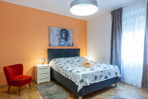 A bed or beds in a room at Apartments Virna