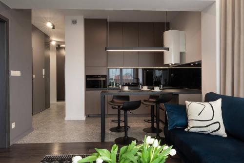 A kitchen or kitchenette at Apartamenty DES-Zator