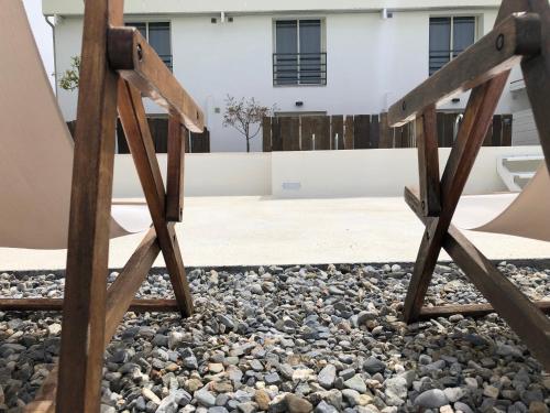 a pair of wooden stairs in a yard at 87029house in Scalea