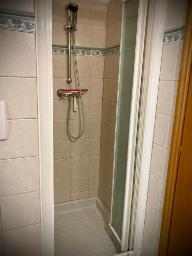 a bathroom with a shower with a bath tub at Ravenna d'Amare in Marina di Ravenna