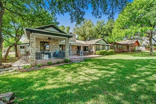a house with a lawn in front of it at Style & Shade in Horseshoe Bay