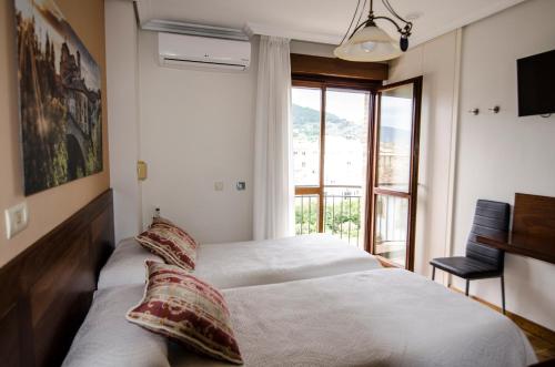 Postel nebo postele na pokoji v ubytování B&B Zaldu