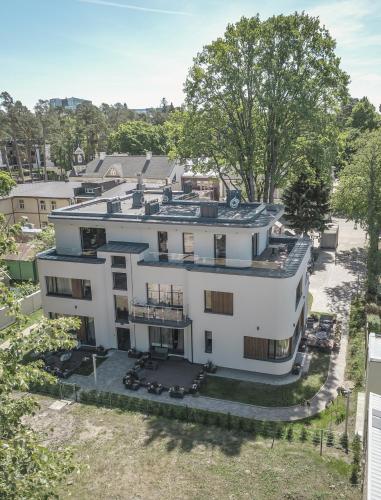an aerial view of a white house at Tamara Suites & Apartments in Jūrmala