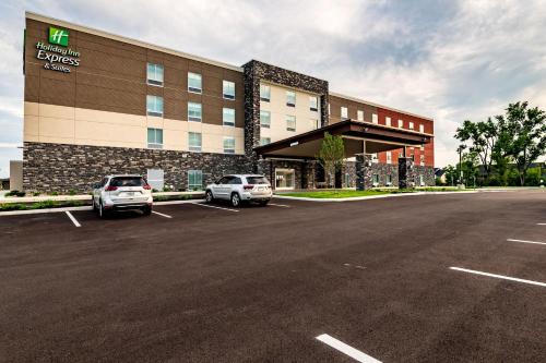 a parking lot in front of a hotel at Holiday Inn Express & Suites Dayton East - Beavercreek by IHG in Beavercreek