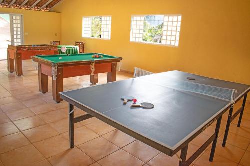 Table tennis facilities sa Pousada Vale do Ouro Verde o sa malapit