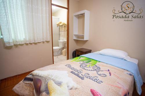 Postel nebo postele na pokoji v ubytování POSADA SALAS & KARI PERU TRAVEL