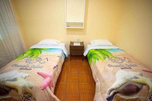 Postel nebo postele na pokoji v ubytování POSADA SALAS & KARI PERU TRAVEL