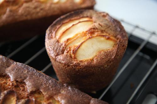 two loaves of bread sitting on a cooling rack at Casa Carmina Hostel in Muros de Nalón