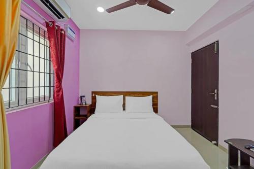 Postel nebo postele na pokoji v ubytování FabHotel Pavis Inn