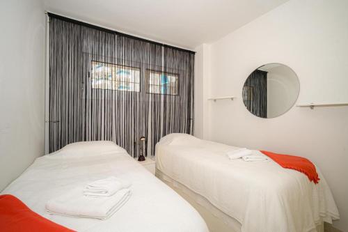 A bed or beds in a room at Estrella 23BH
