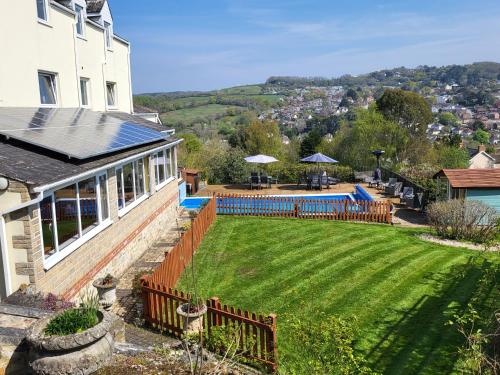an aerial view of a house with a large yard at St Andrews House B&B in Lyme Regis