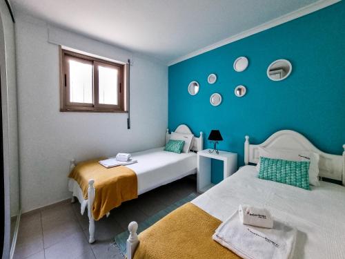 เตียงในห้องที่ FLH Albufeira Old Town Beach Flat