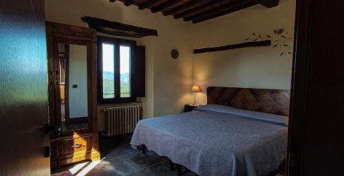 Postel nebo postele na pokoji v ubytování Agriturismo I Monti di Salecchio