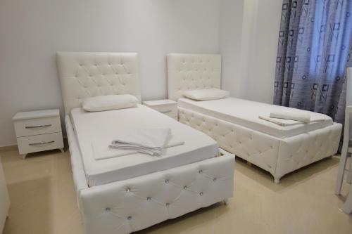 Postel nebo postele na pokoji v ubytování Hotel Dior
