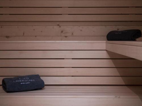 a shelf in a room with two towels on it at Landescape Furnas in Furnas