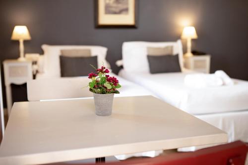 Hotel Broletto - Centro Storicoにあるベッド