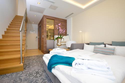 Ένα ή περισσότερα κρεβάτια σε δωμάτιο στο Parkhotel Residenz
