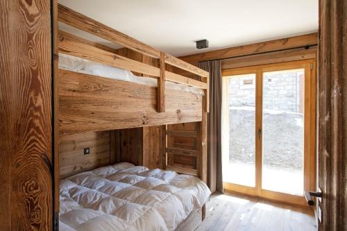 Postel nebo postele na pokoji v ubytování Polaris 1 001 - LUXE & SKI LIFT apartment 6 pers