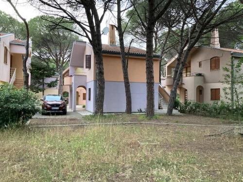 a car parked in front of a house at CALYPSO in Biograd na Moru