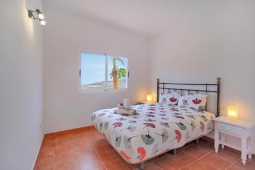 A bed or beds in a room at Villa Rural Los Corcos Private Pool