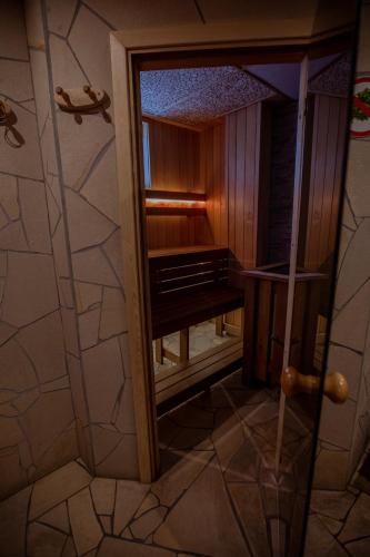 a view of a bathroom with a glass door at Okka Holiday Home in Alajõe