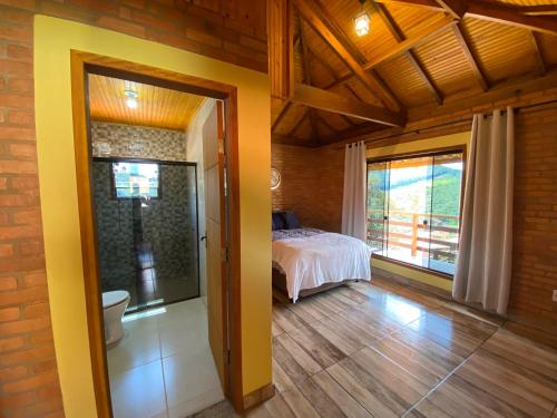 Katil atau katil-katil dalam bilik di Casa Girassol