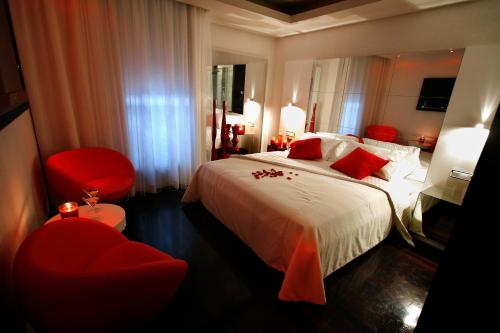 Ένα ή περισσότερα κρεβάτια σε δωμάτιο στο Motel Flamingo