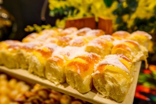 a bunch of pastries on display in a store at ibis Rio de Janeiro Santos Dumont in Rio de Janeiro