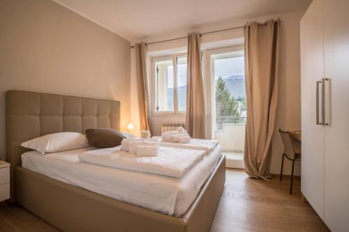Posteľ alebo postele v izbe v ubytovaní Residence La Villa Tesoro