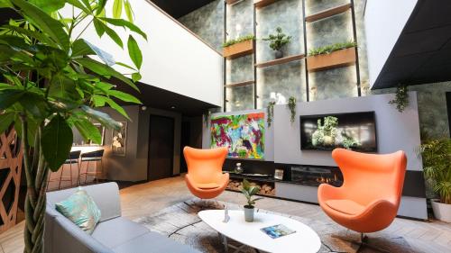 Ruang duduk di Le Magic Hôtel & Spa