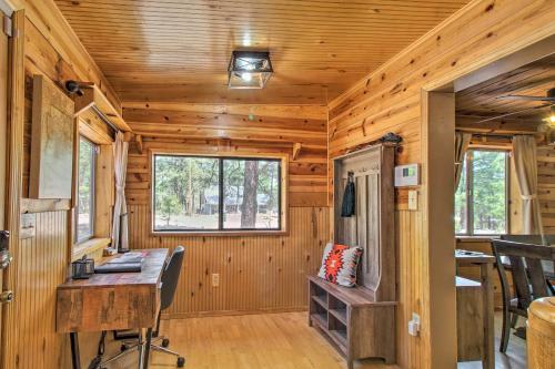 an office in a log cabin with a desk and a window at Large Deck, Grill Pet-Friendly Show Low Retreat! in Show Low