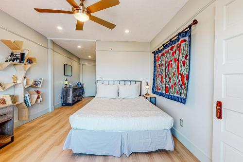 a bedroom with a bed and a ceiling fan at Ogunquit Beach Lookout in Ogunquit