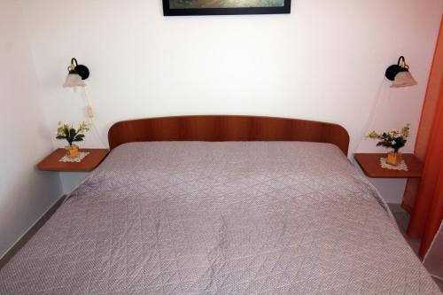 Postel nebo postele na pokoji v ubytování Apartment Mirjana