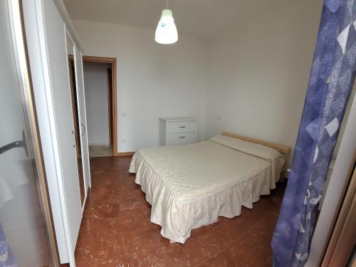 a bedroom with two beds in a room at Villa S.Antonio in Ascea