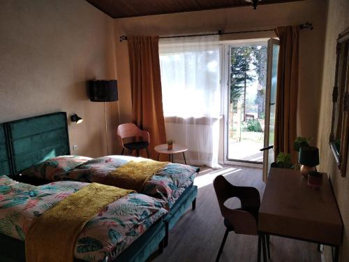 Ένα ή περισσότερα κρεβάτια σε δωμάτιο στο Dreisessel Motel