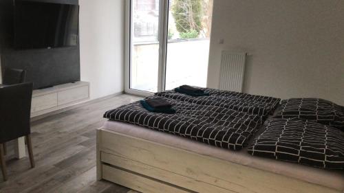 Кровать или кровати в номере Apartmán Lipno