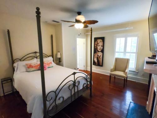 a bedroom with a bed and a ceiling fan at Villa Mulvey # 5 in St. Augustine