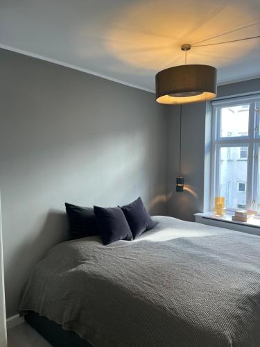 A bed or beds in a room at Luxury new apartment - Heart of Copenhagen