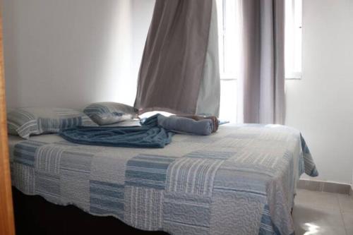 Ein Bett oder Betten in einem Zimmer der Unterkunft Casa com Spa de Hidro com aquecedor a 700 mts do centro