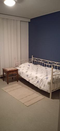 Postel nebo postele na pokoji v ubytování Merirauma Apartments