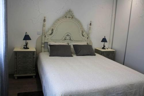 Łóżko lub łóżka w pokoju w obiekcie Casa Onda Spot